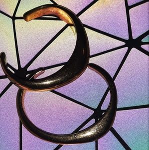 2 gold henri bendel cuffs